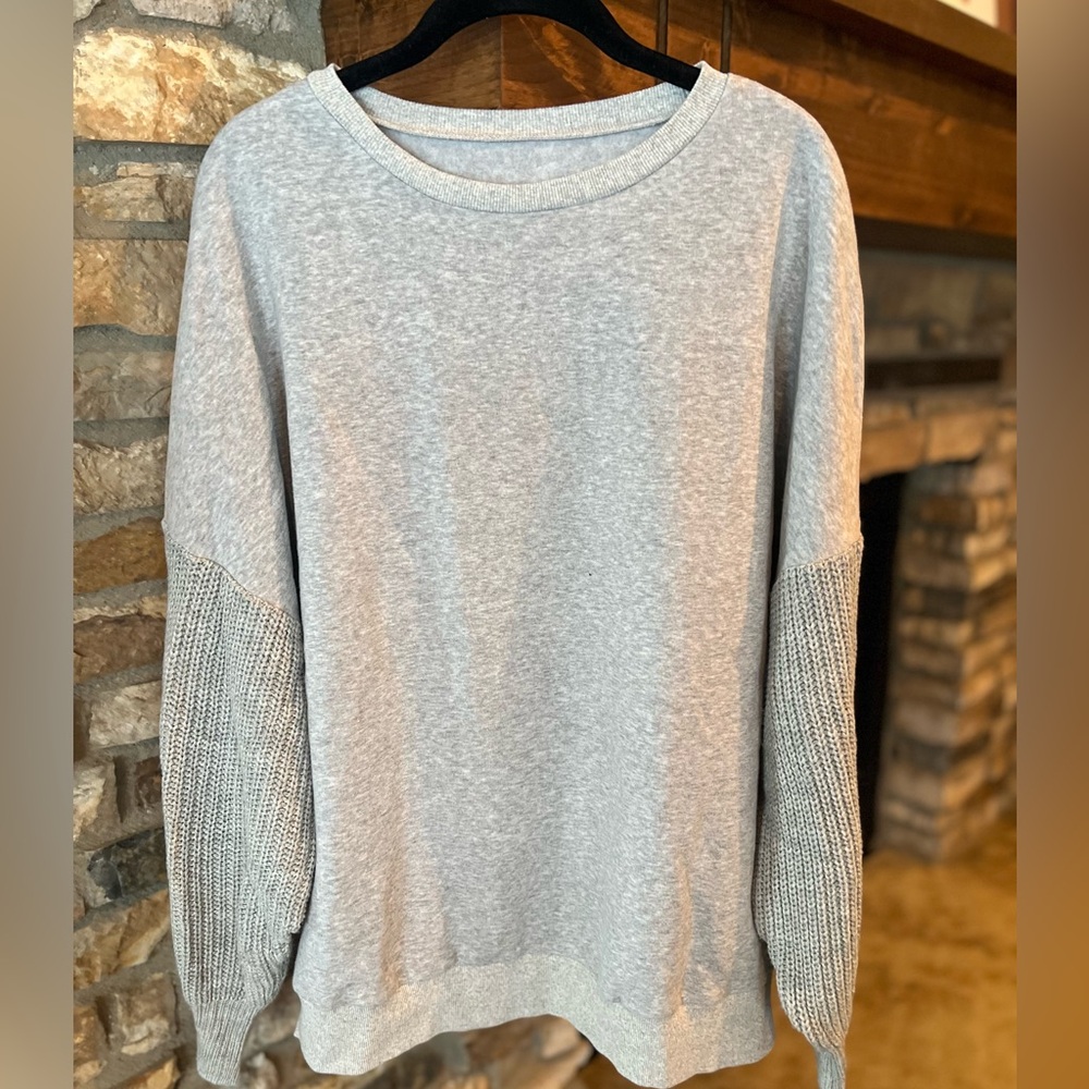 Ladies light gray sweatshirt with cable sweater sleeves